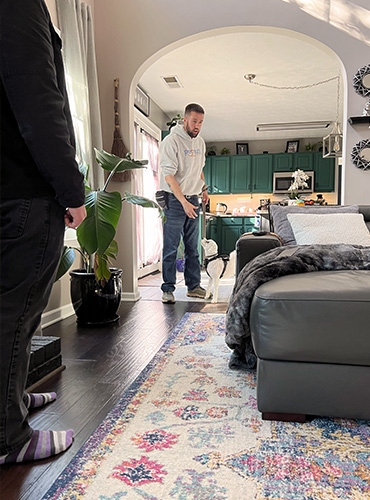 John working with a dog during a behavior modification training session