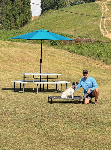 John working with a dog during a private training session